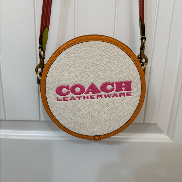 Coach Handbags - Coach White and Orange Round Crossbody Bag